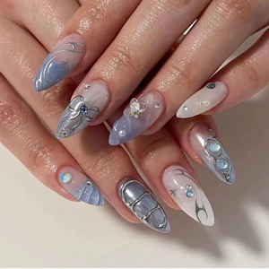 Handmade blue press-on nails with silver metal bow and pearls in long stiletto shape