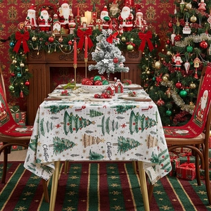 Christmas tablecloth and chair cover set featuring festive trees and Santa Claus patterns
