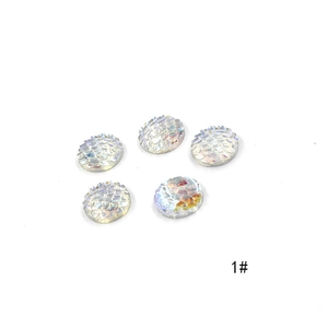 Detailed macro view of 1# round resin cabochons with iridescent fish scale texture