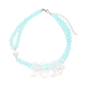 Double-layer necklace with light blue beads, resin flowers and pearls on white background