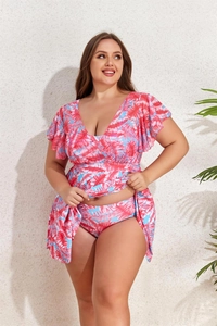 Detail view of plus size tankini swimsuit with tropical leaf print and V-neck ruffle sleeves