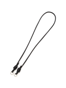 Detail of minimalist black crossbody phone strap featuring silver rings and rope knot