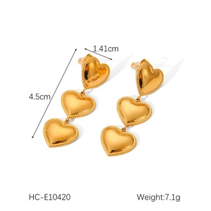 Detail view of 18K gold plated triple heart tassel earrings with dimensions and weight info