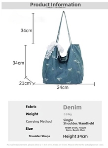 Detailed size specifications for the large denim tote bag with white bow pattern