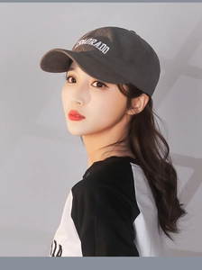 Detail of white COLORADO embroidery on dark grey cotton twill baseball cap for women