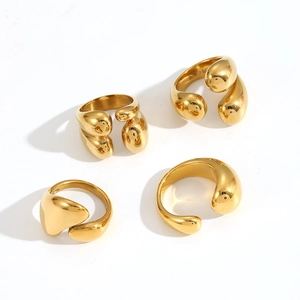 Minimalist 18K gold plated stainless steel teardrop rings set on white background
