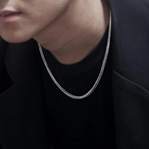 Men's 4mm vintage woven silver snake chain necklace displayed on a male model's neck
