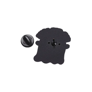 Detailed back view of a black enamel pin with a durable rubber clutch fastener