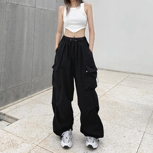Retro black multi-pocket cargo pants in loose straight-leg fit with drawstring details