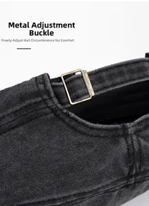 Detail of the bronze metal adjustment buckle on the washed cotton cadet army cap