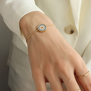 French style 18K gold plated snake chain bracelet with blue enamel daisy pendant