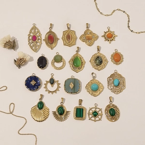 Assorted 18k gold plated stainless steel pendants with natural colorful gemstones