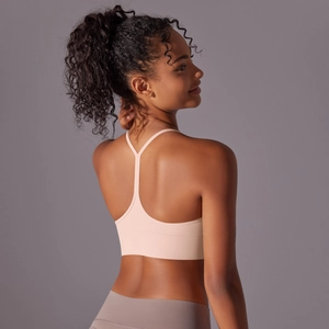 Detail of soft brushed yoga bra showing Y-back straps and seamless athletic fabric