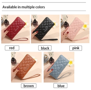 Multiple colors of quilted PU leather long wallets with wristlets shown in a neat row