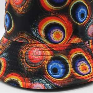 Colorful tie-dye digital print reversible bucket hat with psychedelic sunburst pattern