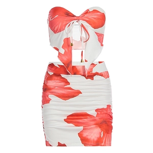 Detail of floral two-piece set featuring ruched mini skirt and drawstring crop top