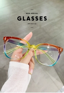 Detail shot of stylish gradient rainbow frame glasses with anti-blue light resin lenses