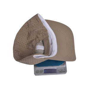 Detail showing ultra-lightweight mesh baseball cap weighing only 46.2g on a scale