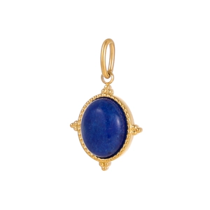 Detail of blue lapis stone pendant with gold granulated bezel and rounded loop