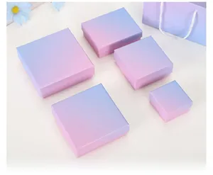 Various sizes of pearlescent gradient pink and blue jewelry boxes with lid and base design