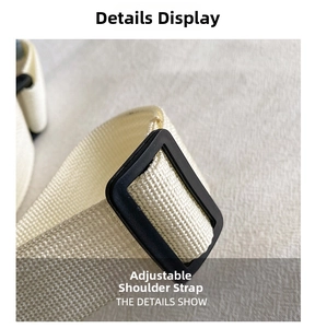 Macro shot of durable off-white nylon webbing strap with matte black plastic slider buckle