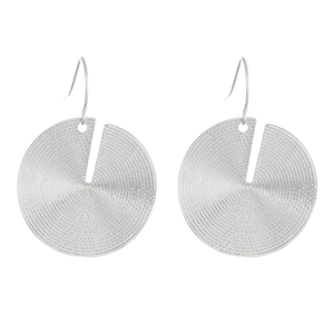 Macro detail of silver geometric spiral textured metal earrings with hook closure