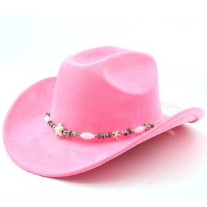 Detail of pink faux suede cowboy hat featuring bohemian beaded band and star accents