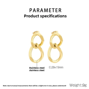 Detailed view of gold twisted chain link earrings with 29x15mm dimensions and 9g weight