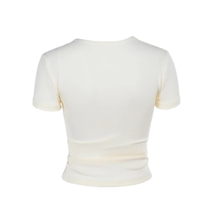 Vue arrière d'un t-shirt crème ajusté avec des détails de bordure en maille élégants