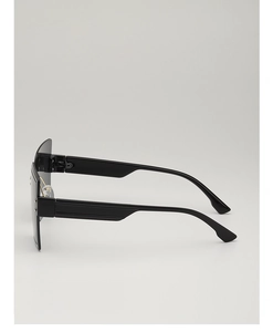 Side view of black oversized sunglasses showing streamlined temple design and sturdy hinges