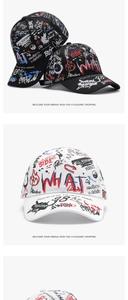 Close-up of colorful street graffiti prints on black and white sunshade baseball caps
