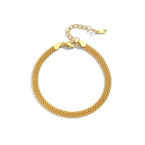 Minimalist gold woven mesh bracelet with adjustable lobster clasp on white background