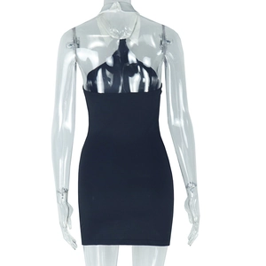 Detail of black backless halter mini dress with sleek slim fit on ghost mannequin