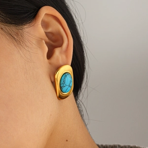 Boucles d'oreilles vintage en plaqué or 18k avec pierre turquoise au design géométrique