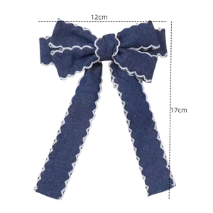 Navy denim bow hair clip with white lace trim for women and girls, 12cm by 17cm