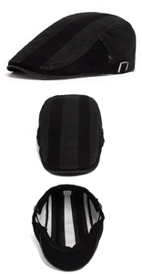 Detail of adjustable metal buckle and striped lining on black cotton flat cap