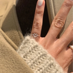 Minimalist 925 sterling silver open heart ring shown on finger for a stylish daily look