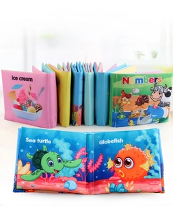 Detailed view of soft fabric baby books featuring numbers and sea animals for early learning