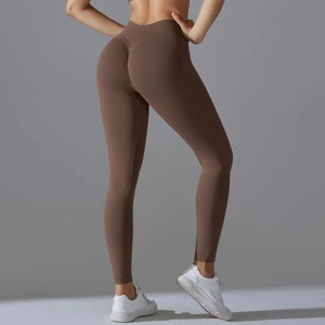 Detail of dark brown high waisted seamless yoga leggings with scrunch butt lifting effect