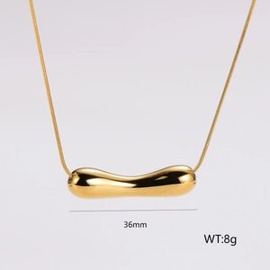 Close-up of golden curved bean pendant showing 36mm length and 8g weight specs