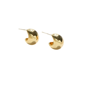 Polished golden stainless steel C-shaped chunky drop earrings on white background