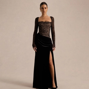Detailed view of the elegant black lace bodice and high-slit velvet long evening dress