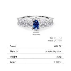 French vintage s925 silver halo ring featuring an oval blue gem and sparkling pavé diamonds