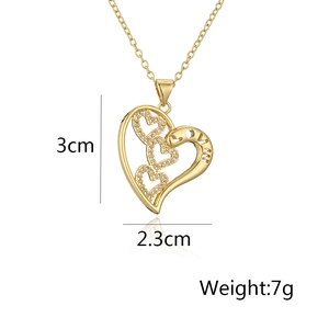 Close-up of 18K gold plated heart pendant with zircon inlay showing 3cm x 2.3cm dimensions