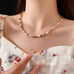 Elegant natural freshwater pearl necklace with vintage beads and gold metallic accents