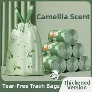 Macro view of thickened camellia scented drawstring garbage bags with cute bear prints