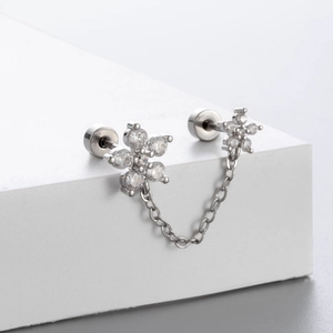 Clous d'oreilles nœud en argent avec zircon, chaîne fine et fermoir à vis