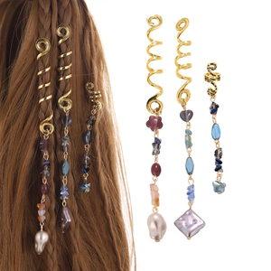Golden spiral hair rings with crystal stone pendants for braided hairstyles on white background