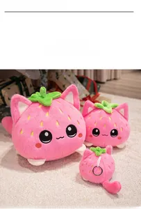Three sizes of pink strawberry cat plush toys with soft fur texture and metal keychain