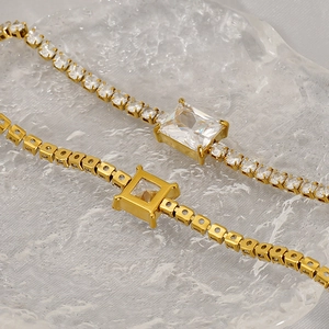 Golden stainless steel tennis bracelet set with square and rectangular zirconia stones
